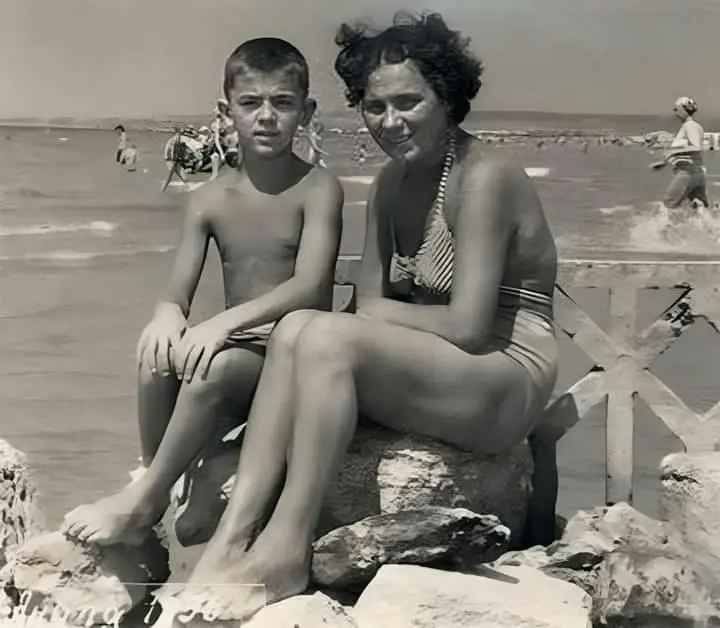 A Young Boy on Vacation with His Mother