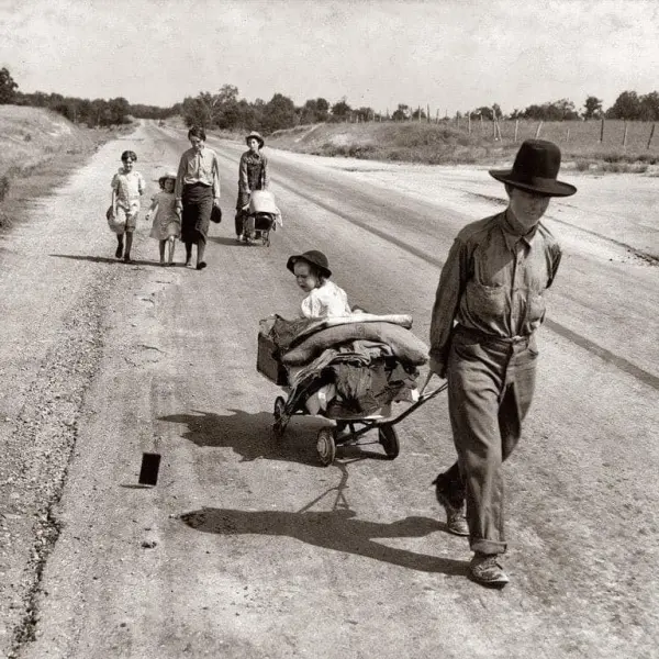 A family leaving their home 