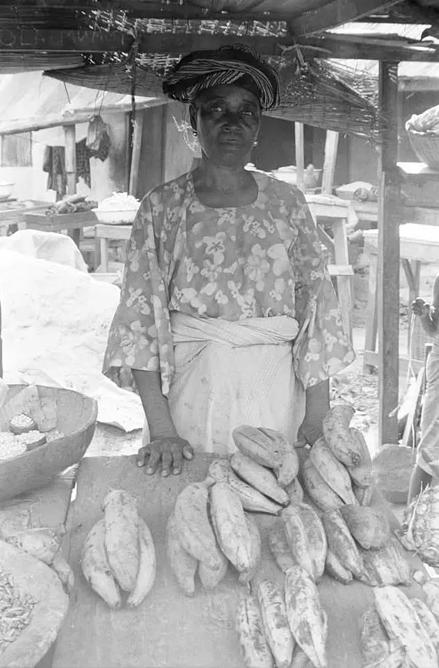 A plantain seller at Ibuko Market.jpg