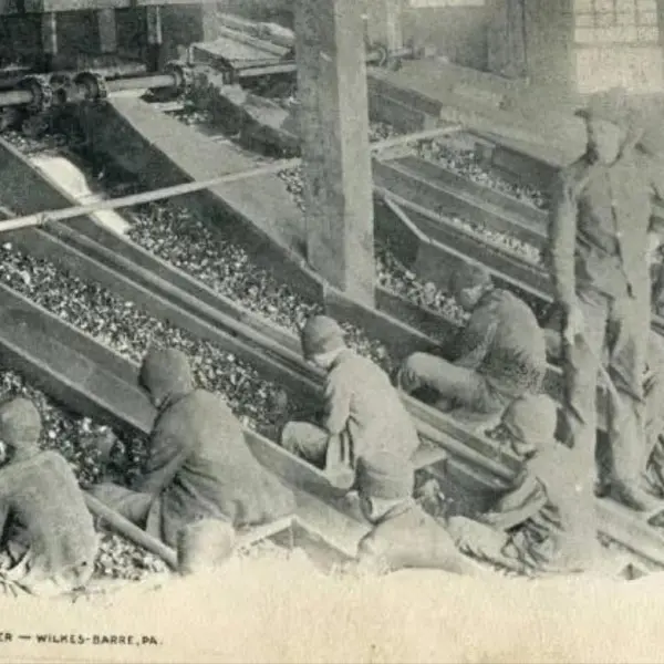 Children work in the coal mines