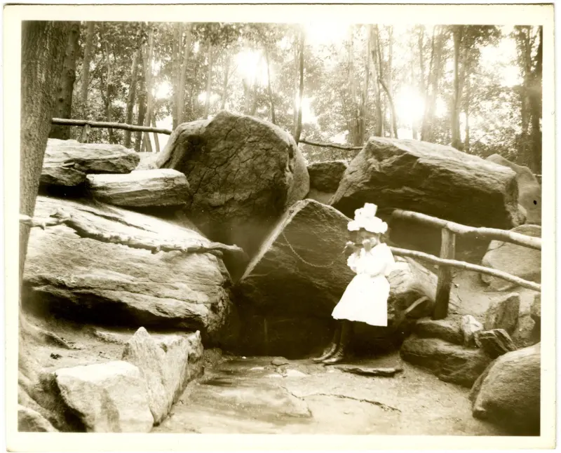Unidentified girl drinking at Montaigne's Spring, McGown's Pass, Central Park
