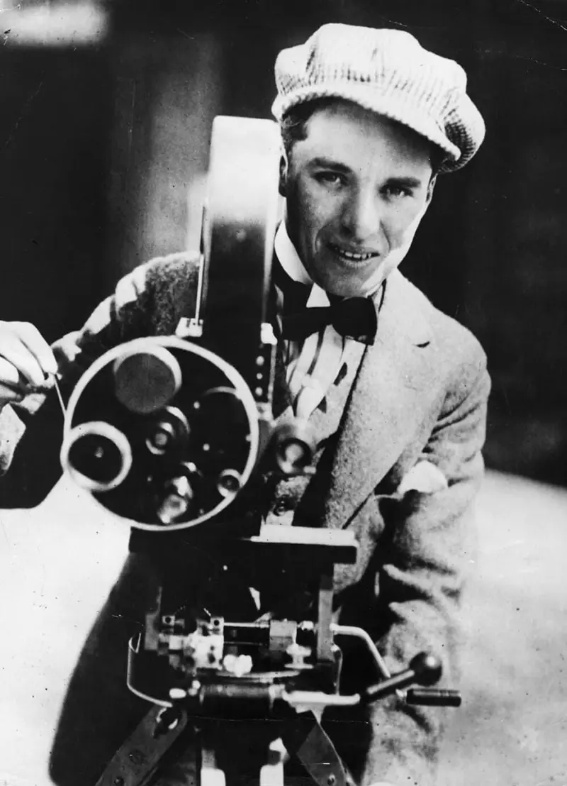Charlie Chaplin with a camera