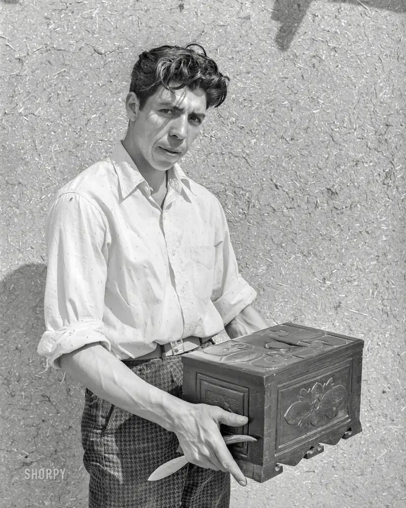 Spanish-American boy with a chest he carved himself.
