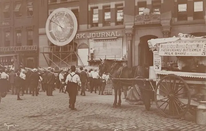 The milk wagon has arrived on Park Row