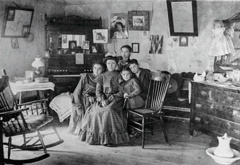 Some members of a family pose for a photograph