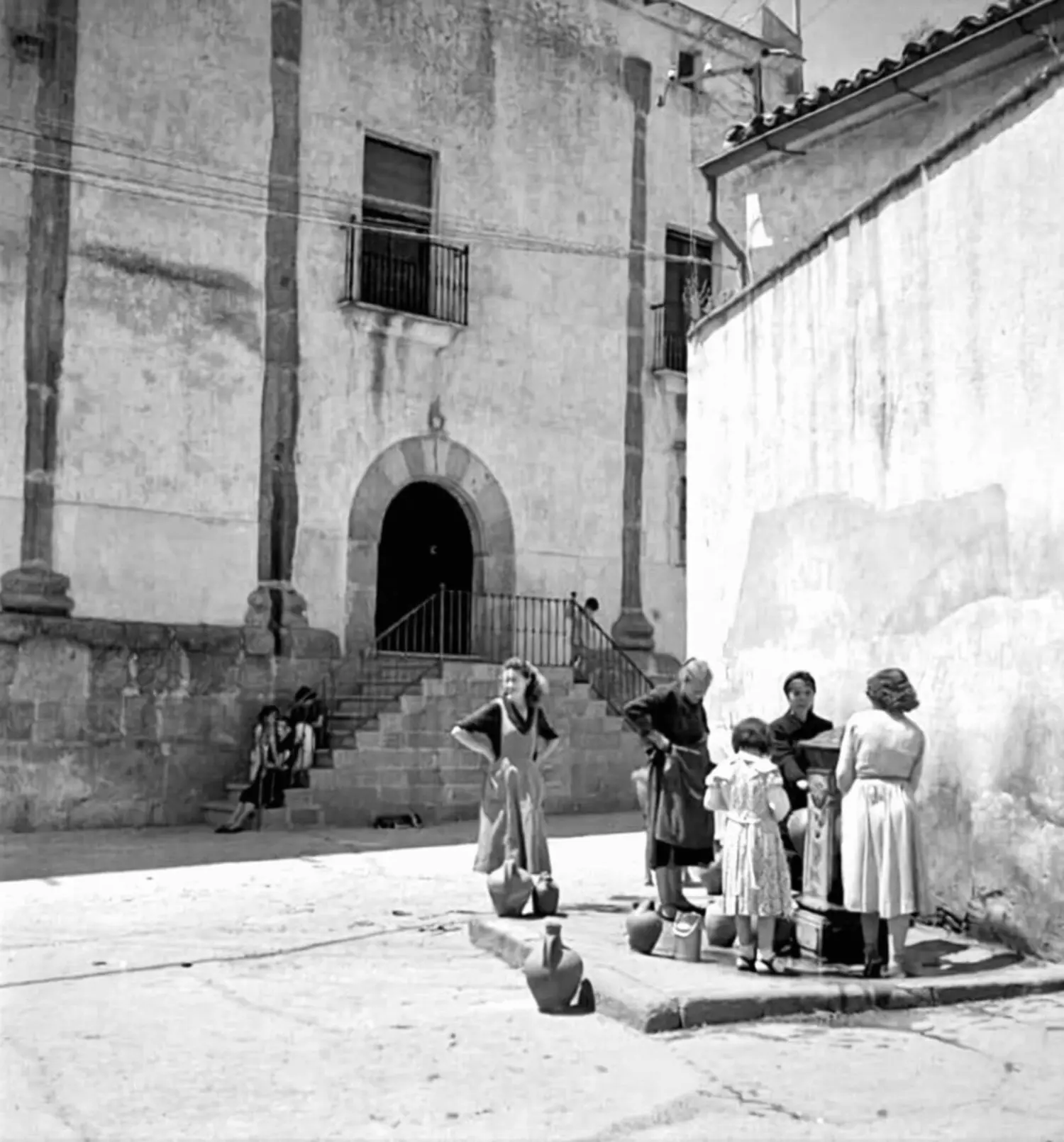 Mujeres llenando los cántaros