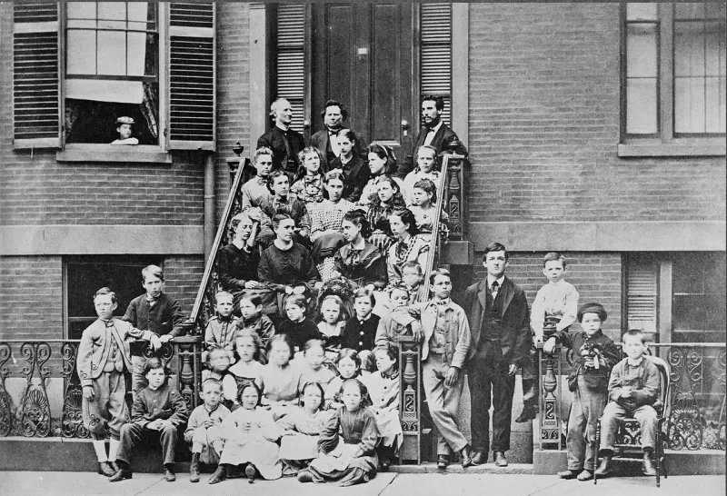 Alexander Graham Bell, top right at the Boston School for Deaf Mutes