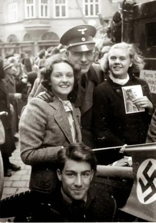 Austrian girls celebrate the Anschluss with a German soldier