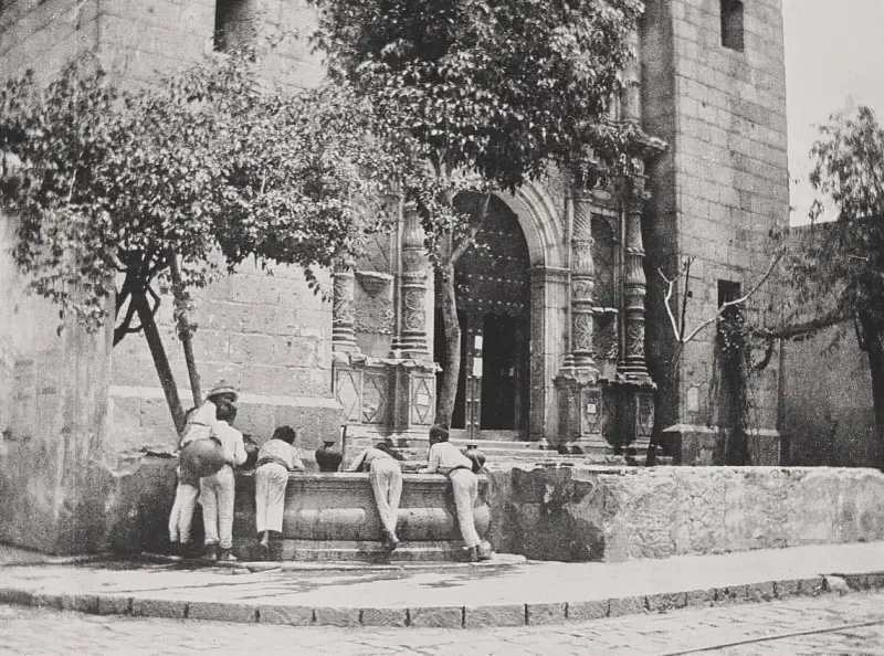 Aguadores en la fuente 