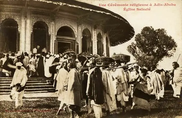 People gathered around the wreckage.