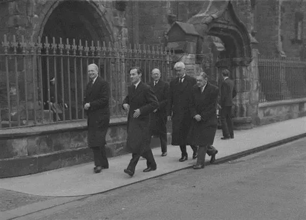 T.S. Eliot (R) and Others on North Street
