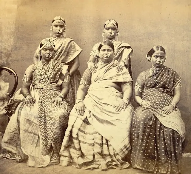 five women wearing jewellery