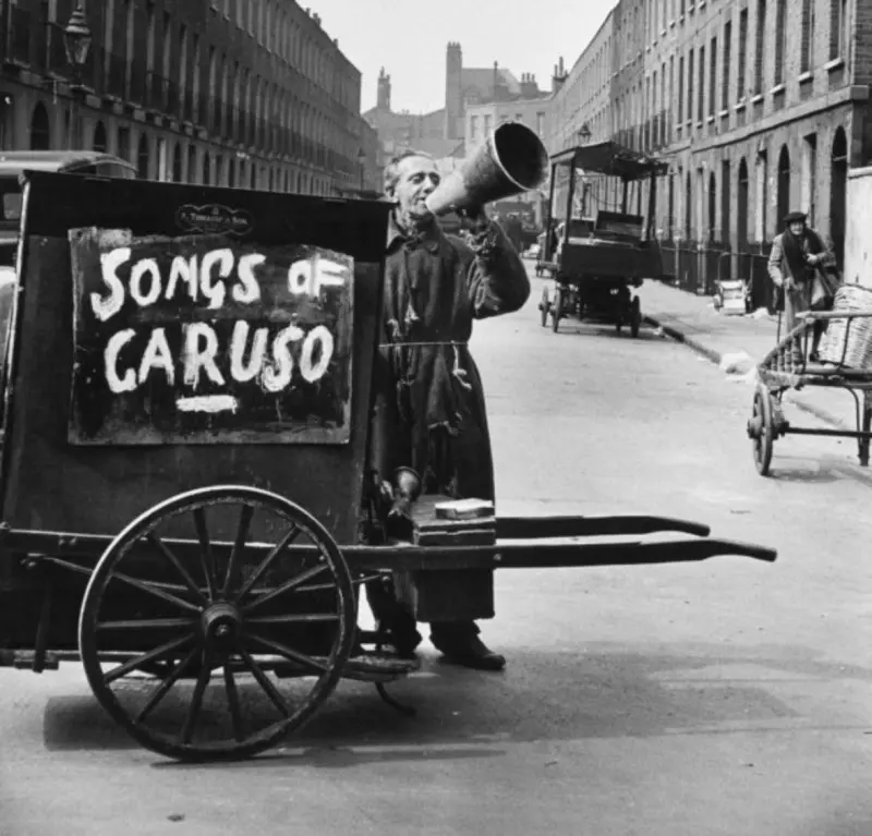 Barrel organ player.