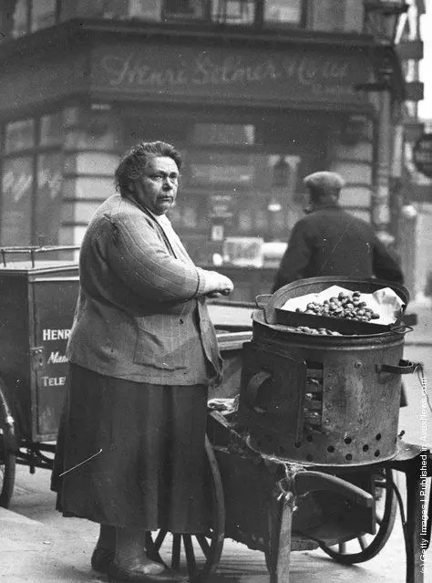 Woman selling hot chestnuts in Soho