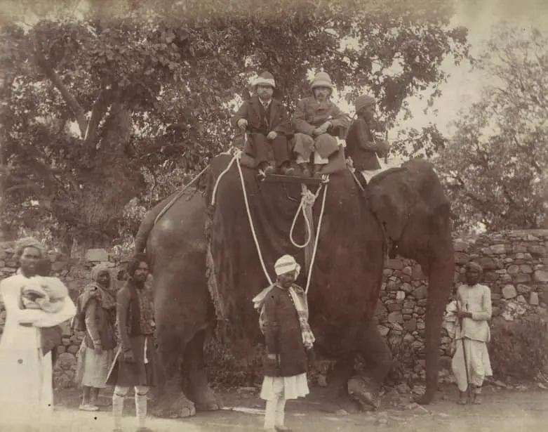 Early tourists on an elephant ride