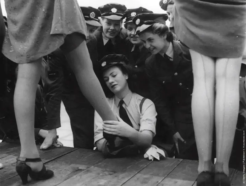 Female military personnel looking at model 731 stockings