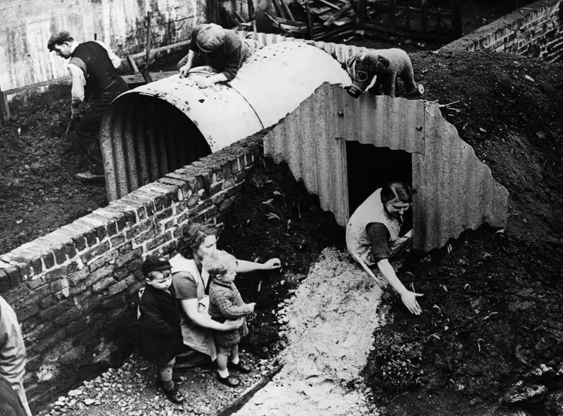British Family Building an Anderson Bomb Shelter
