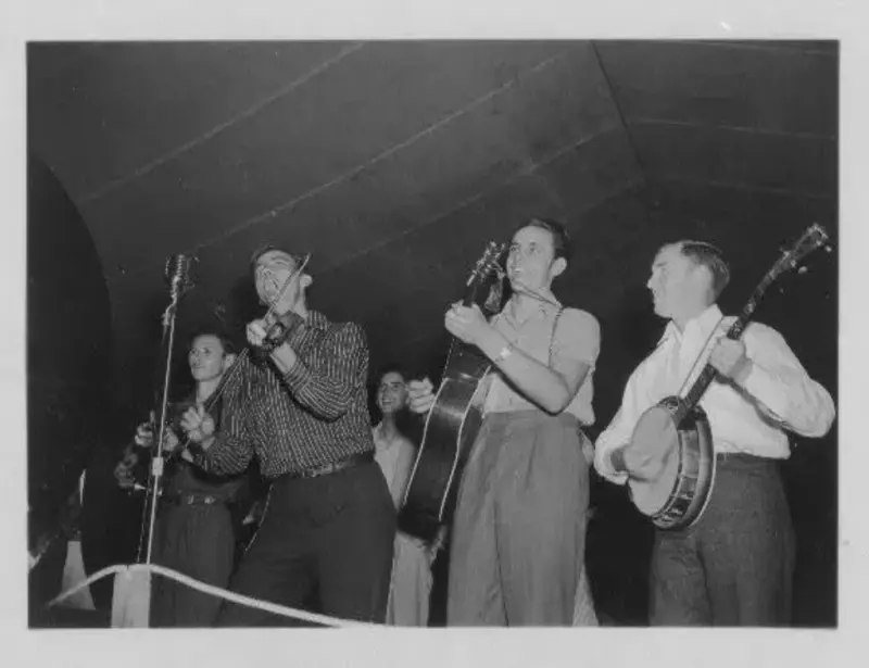 Four musicians performing at the Mountain Music Festival