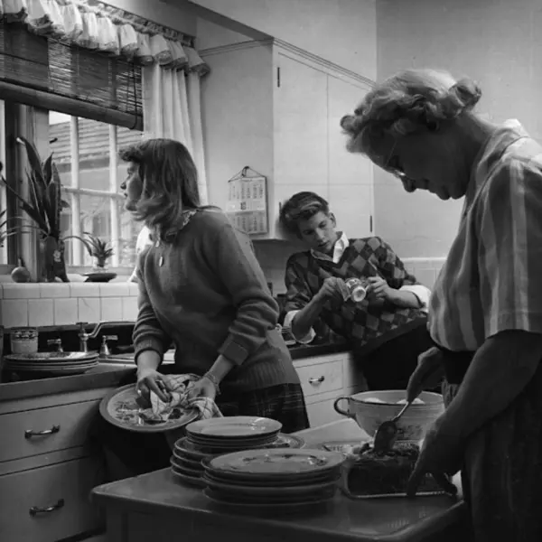 Teenagers helping grandma