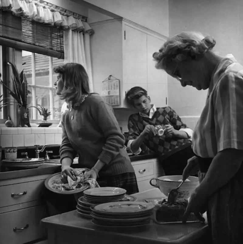 Teenagers helping grandma