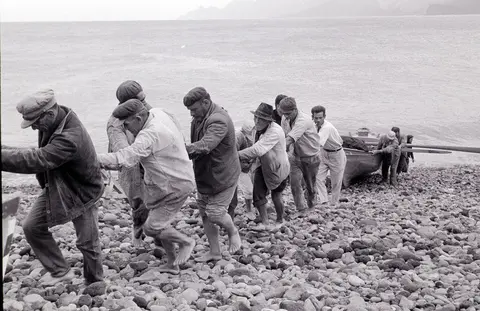 Pescadores en la playa