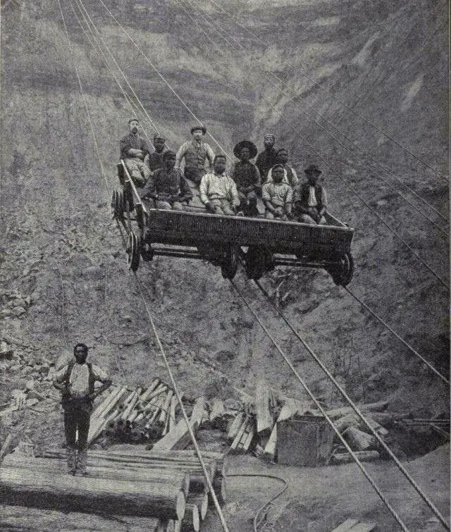 Miners using an aerial tram at a diamond mine