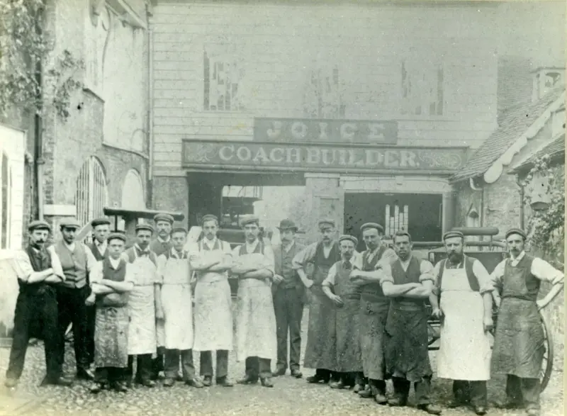 Staff standing outside John Joice, Coach Builder