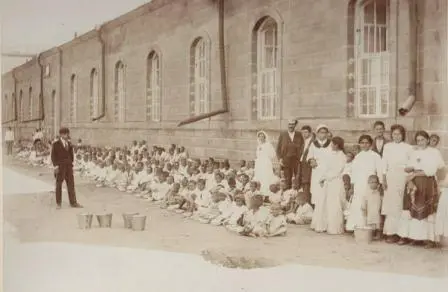 Students of Etchmiadzin Orphanage Eating in the Courtyard