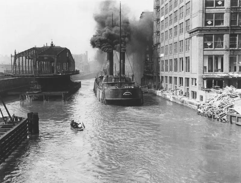 The Tugboat Binghampton passes the Adams Street swing bridge