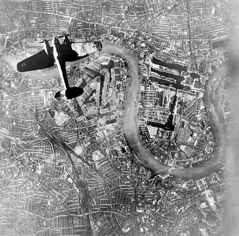 A German Heinkel He 111 bomber over the Surrey Commercial Docks