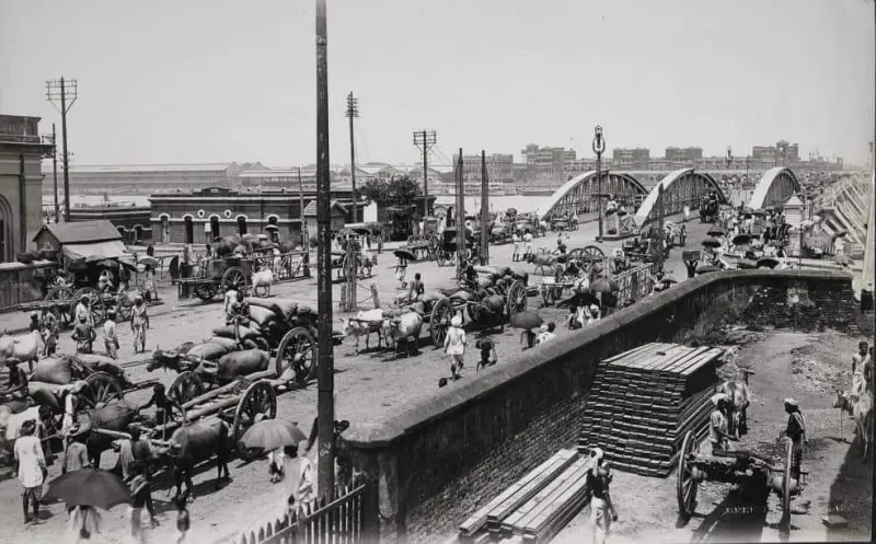 Howrah Bridge with Howrah Station in the background.