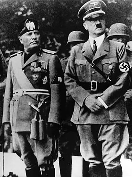 Benito Mussolini and Adolf Hitler stand together