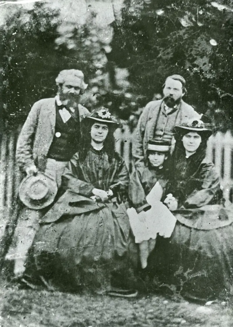 Marx with his daughters and Engels