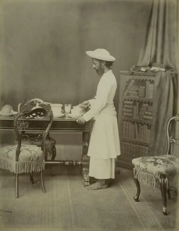 A Khidmatgar preparing tea