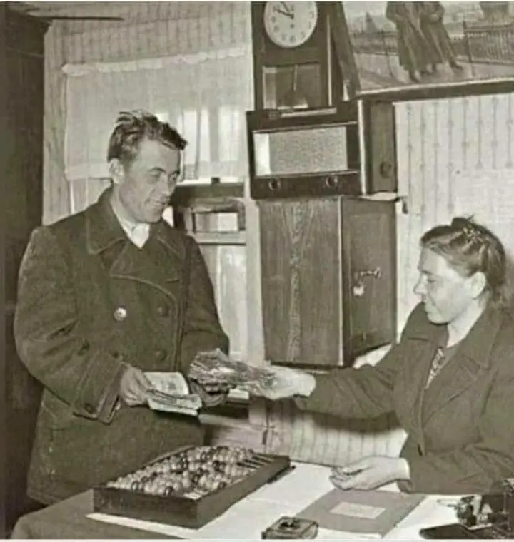 Farm worker receiving an interest-free loan Farm worker receiving an interest-free loan