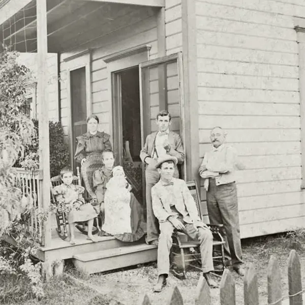 A family outside their home