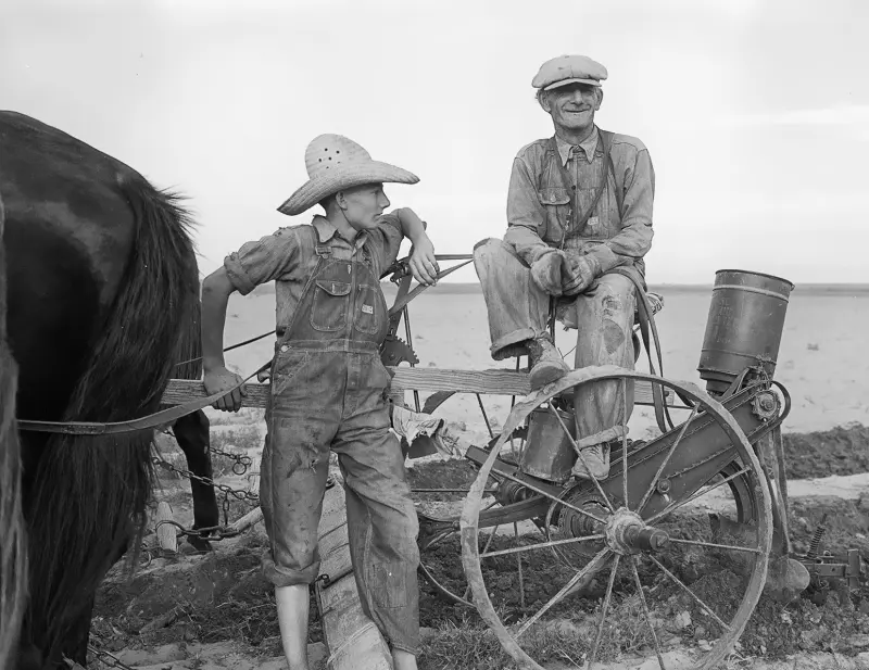 A farmer and his son