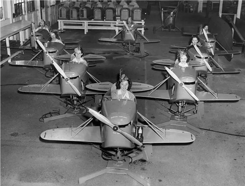 Girls learn to fly an airplane