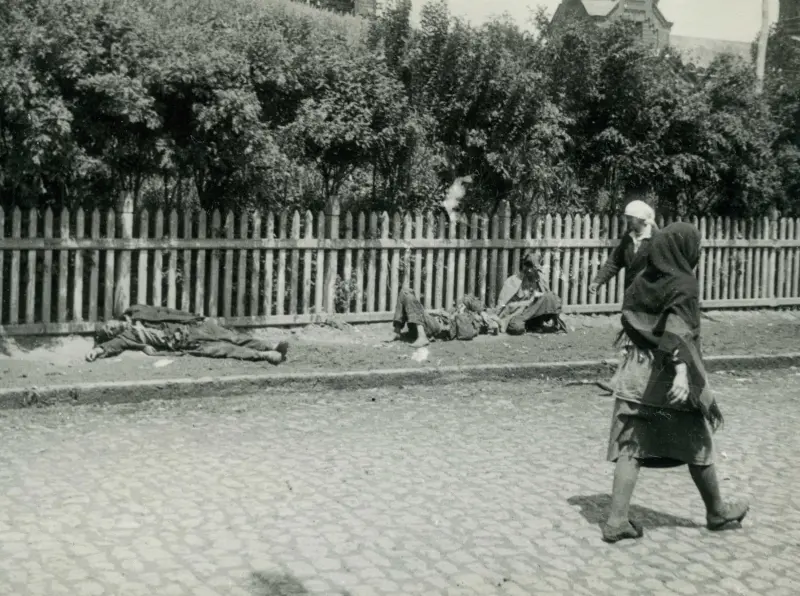 Starved peasants on a street during Holodomor