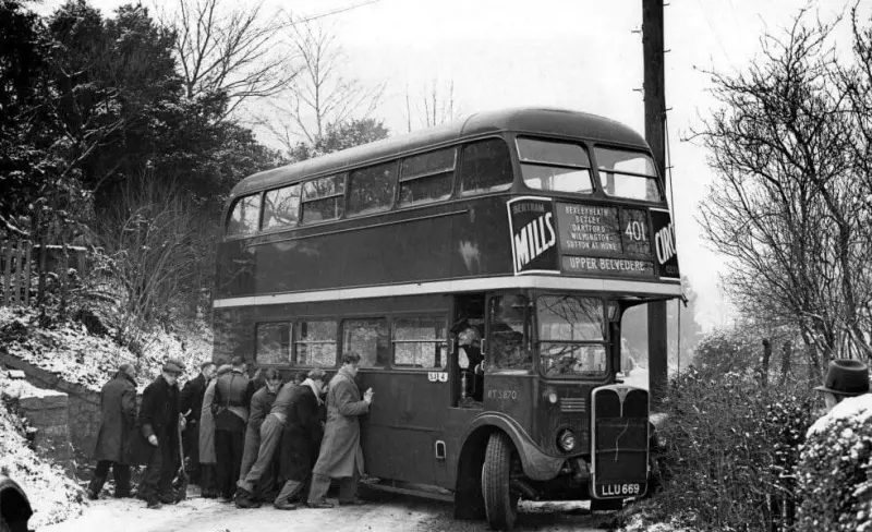 Passengers Push a Stuck Bus