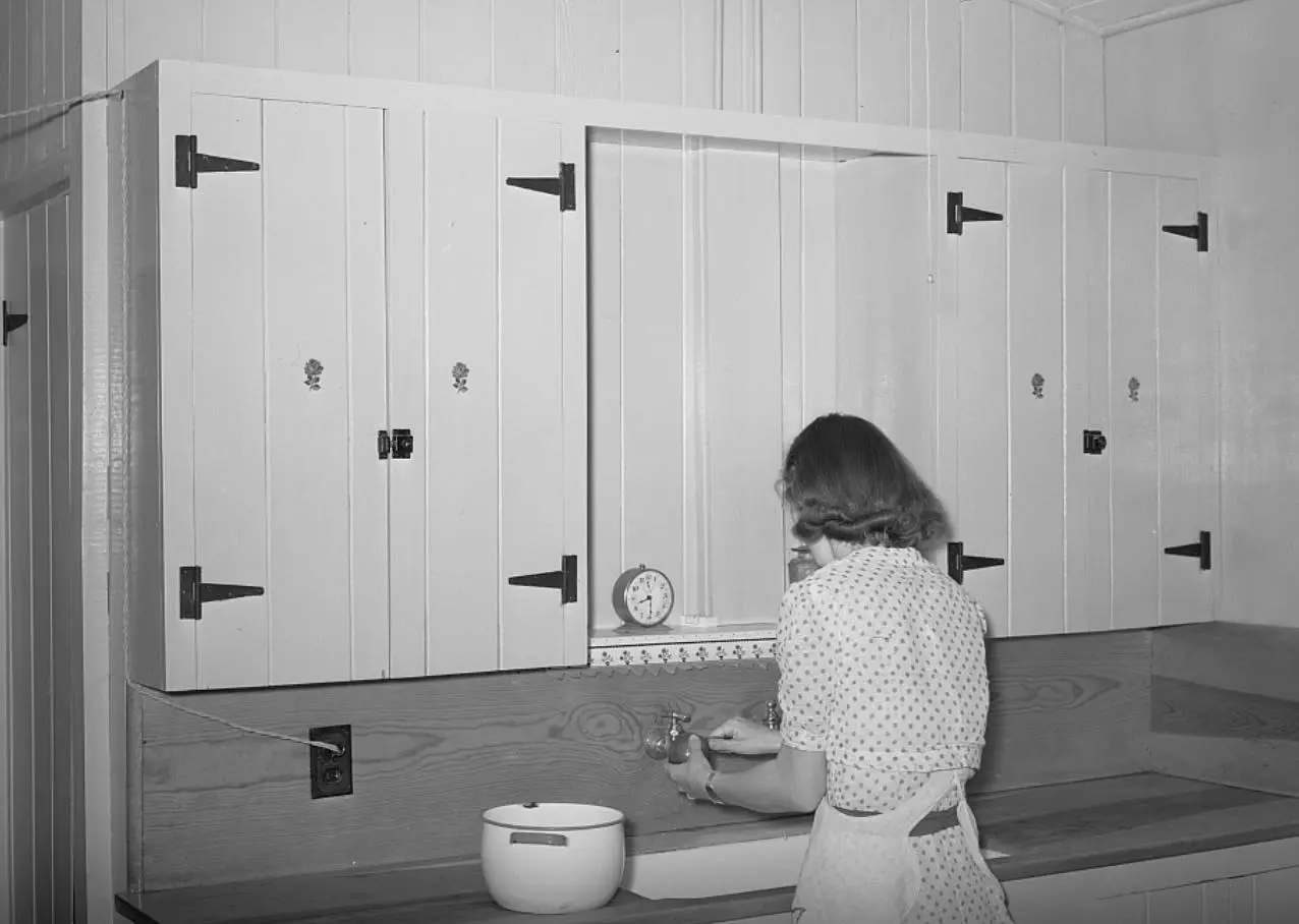 A farmer’s wife prepares food 