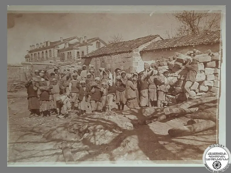 Armenian orphans building a dam and transport stones to build a self-defense barrier