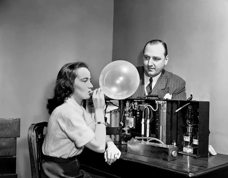 Dorothy Brengel William Foden, testing the Drunkometer breathalyzer
