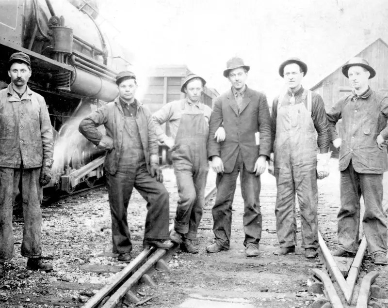 The crew of a logging train 