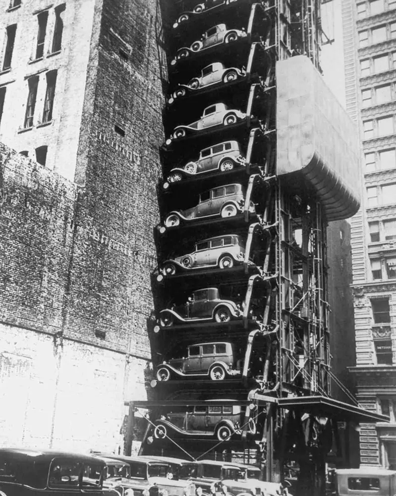 48 cars in a elevator parking garage in Downtown business district, USA. Built by the Westinghouse Electric and Manufacturing Company,