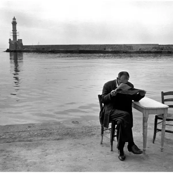 A man sits quietly
