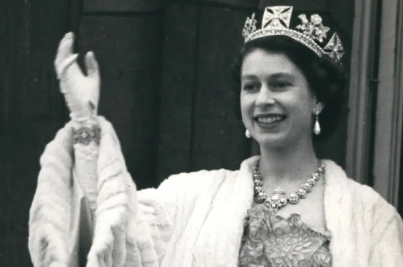 Queen Elizabeth II welcomes from the balcony
