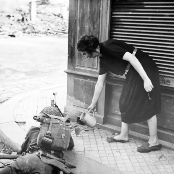 A French women pouring cider